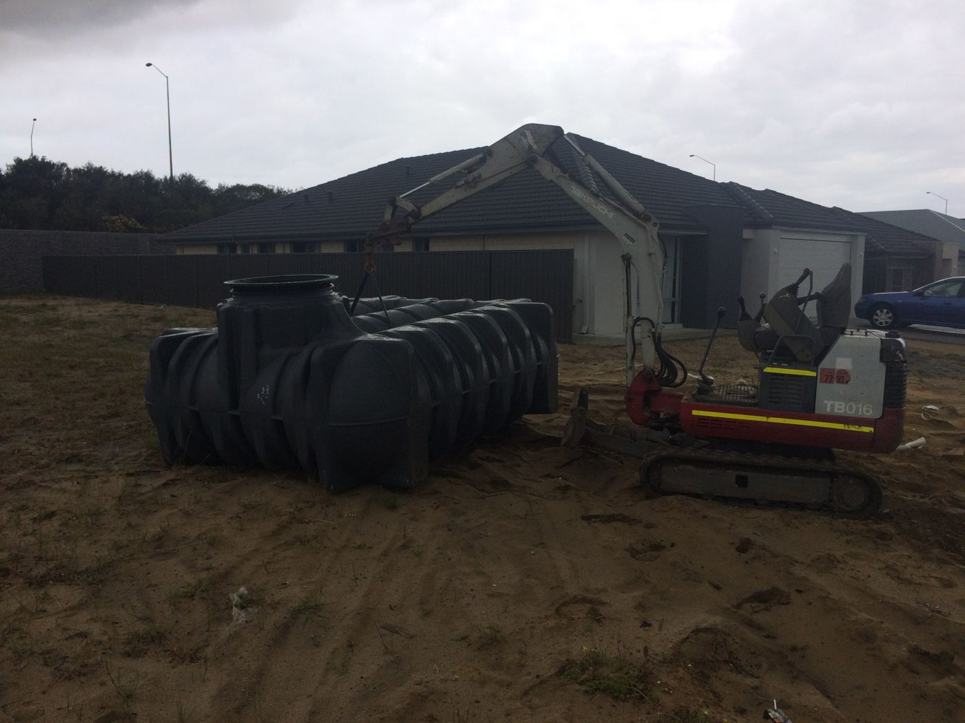 Mini excavator on site